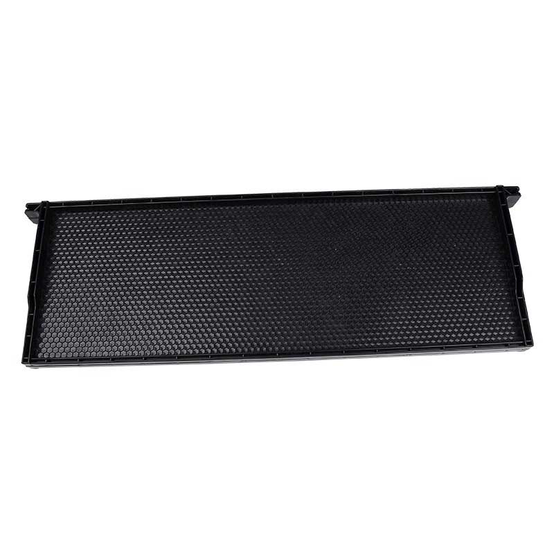 black plastic frame with comb foundation
